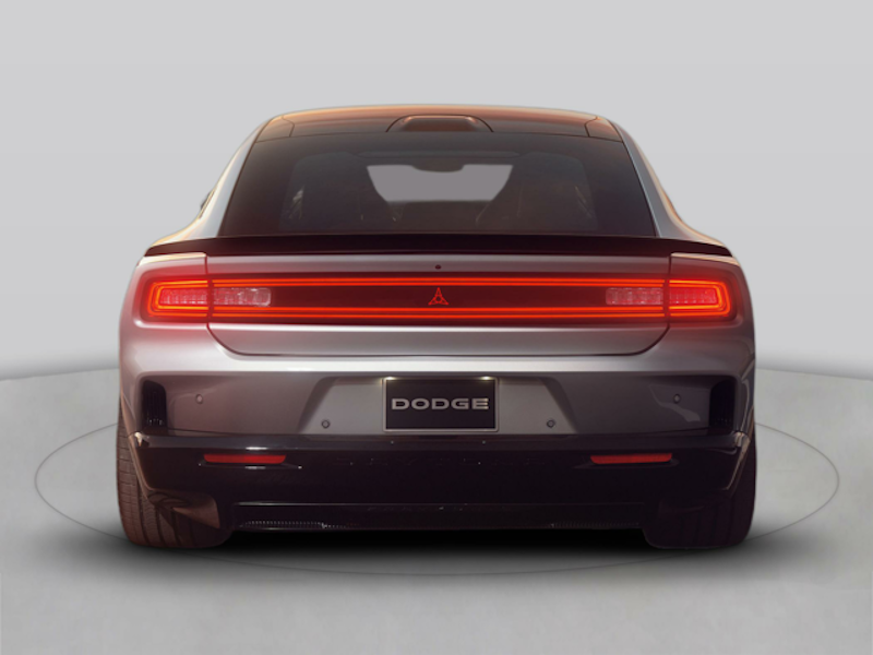 The rear end of the 2025 Dodge Charger Daytona in a showroom