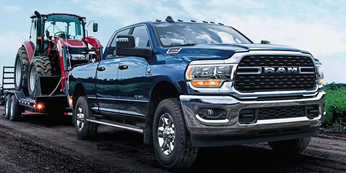 The 2025 RAM 2500 hauling machinery with its impressive towing capacity