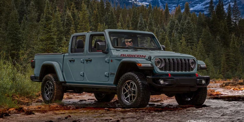 A 2026 Jeep Gladiator, a rugged off-road truck, showcasing its robust design and adventurous spirit.